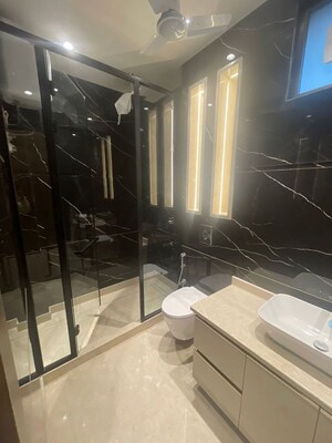 Bathroom in 3.5 BHK Apartment at Defence Colony – for Rent