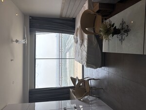 Staircase in 2 BHK Apartment at Supertech Supernova Nova Residences, Sector 94 – for Rent