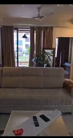 Living Room in 2 BHK Apartment at Kiara Residency, Sushant Golf City – for Rent