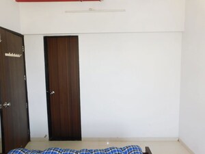 Room in 2 BHK Apartment at Milap CHS, Andheri West – for Rent