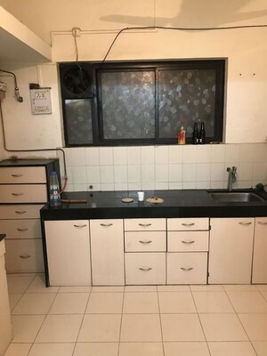 Kitchen in 3 BHK Apartment at Gananjay Society, Kothrud – for Rent