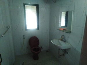 Bathroom in 3 BHK Apartment at Gokhale Manik, Prabhat Road – for Rent