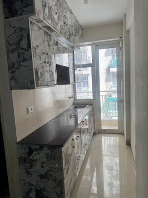 Kitchen in 1 BHK Apartment at Mittal Rajnagar Residency, Raj Nagar Extension – for Rent