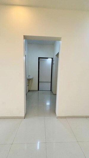 Building Lobby in 2 BHK Apartment at Vishnu Vertex, Kalyan East – for Sale