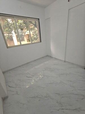 Room in 2 BHK Apartment at Leena Samrat Plaza CHS, Kansai – for Sale