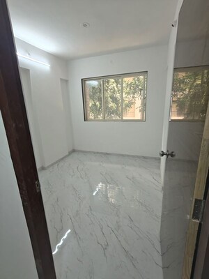 Room in 2 BHK Apartment at Leena Samrat Plaza CHS, Kansai – for Sale