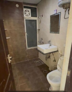 Bathroom in 3 BHK Apartment at M R Platinum 321, Raj Nagar Extension – for Rent