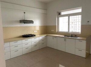 Kitchen in 4 BHK Apartment at Amar Renaissance, Ghorpadi – for Rent