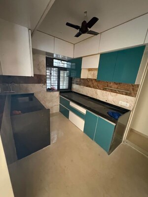 Kitchen in 2 BHK Apartment at Mamta Apartment Andheri, Andheri West – for Rent