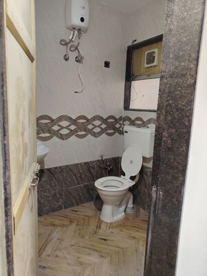 Bathroom in 2 BHK Apartment at Rail Vihar CHS, Kharghar Sector 4 – for Rent