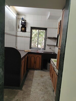 Kitchen in 2 BHK Apartment at Rail Vihar CHS, Kharghar Sector 4 – for Rent