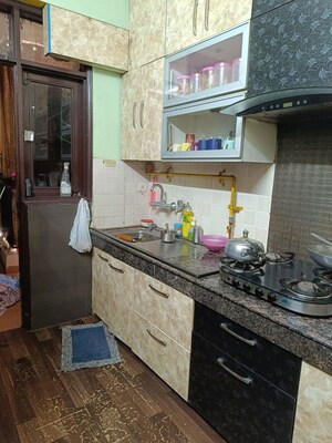 Kitchen in 3 BHK Apartment at Vasundhara Sector 18 – for Sale