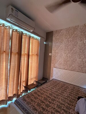 Bedroom in 3 BHK Apartment at Emaar Palm Gardens, Sector 83 – for Rent