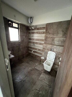 Bathroom in 2 BHK Apartment at JPV Pratap Elegance, Vile Parle West – for Rent