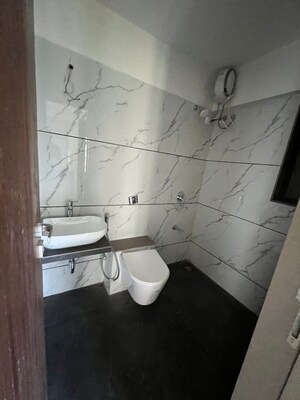 Bathroom in 2 BHK Apartment at JPV Pratap Elegance, Vile Parle West – for Rent