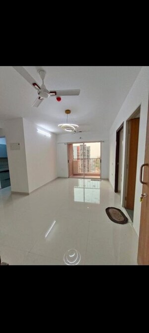 Living Room in 1 BHK Apartment at Runwal Palm, Kolshet – for Sale