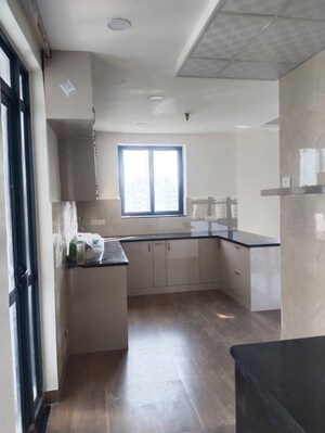 Kitchen in 1 RK Apartment at Unitech Uniworld Gardens, Sector 47 – for Rent