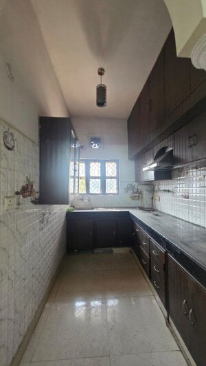 Kitchen in 2.5 BHK Apartment at Gaur City 2 - 10th Avenue, Sector 16c Greater Noida – for Sale