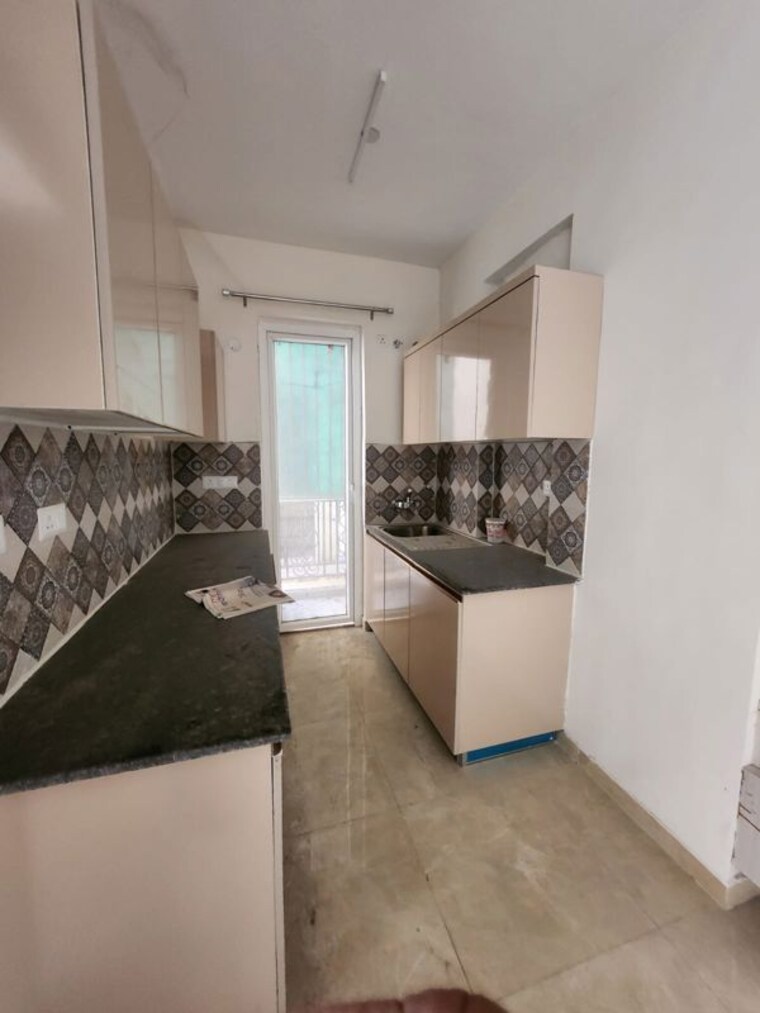 Kitchen, signature-global-park-4-and-5 2.5 Bedroom 1120 Sq.Ft. Apartment In Sohna Sector 36 Gurgaon 10311416