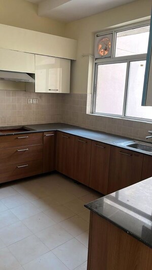 Kitchen in 3 BHK Builder Floor at Ansal API Esencia, Sector 67 – for Rent