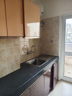 Kitchen in 2 BHK Apartment at AWHO Shanti Vihar, Sector 95 – for Sale