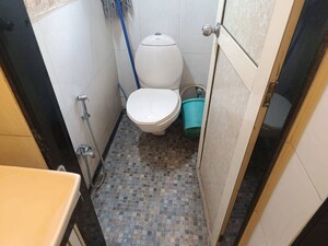 Bathroom in 2 BHK Apartment at Lokhandwala Breeze Apartments, Andheri West – for Rent