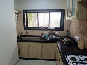 Kitchen in 2 BHK Apartment at Lokhandwala Breeze Apartments, Andheri West – for Rent
