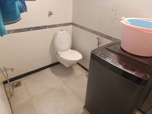 Bathroom in 2 BHK Apartment at Lokhandwala Breeze Apartments, Andheri West – for Rent