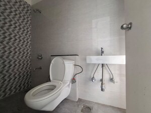 Bathroom in 3 BHK Apartment at Sheth Vasant Lawns, Laxmi Nagar – for Rent