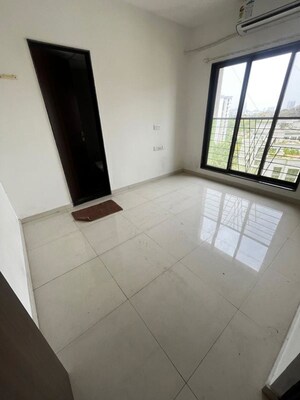 Room in 1 BHK Apartment at Lalani Valentine Apartment 1 Wing D, Malad East – for Rent