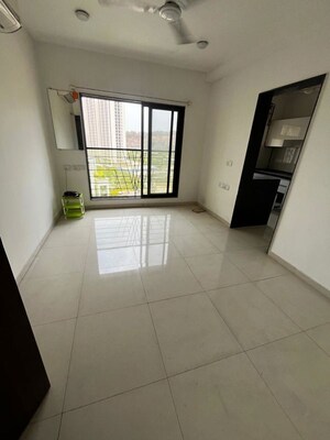 Living Room in 1 BHK Apartment at Lalani Valentine Apartment 1 Wing D, Malad East – for Rent