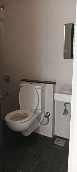 Bathroom in 3 BHK Apartment at Sheth Vasant Lawns, Laxmi Nagar – for Rent