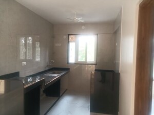 Kitchen in 3 BHK Apartment at Pimple Saudagar – for Sale