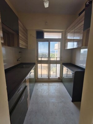 Kitchen in 1 BHK Apartment at Vijay Orovia, Ghodbunder Road – for Rent