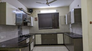 Kitchen in 3 BHK Builder Floor at Sushant Lok I – for Sale