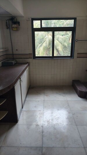 Kitchen in 2 BHK Apartment at Neelam CHS Santacruz, Santacruz West – for Rent
