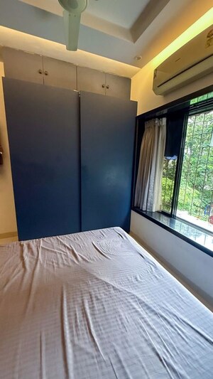 Bedroom in 2 BHK Apartment at New Ramratan CHS, Mahim West – for Sale