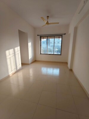 Living Room in 1 BHK Apartment at Shree Prastha CHS, Owale – for Rent