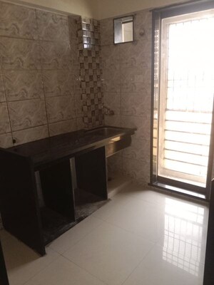 Kitchen in 1 BHK Apartment at Ritu Gardenia, Naigaon East – for Sale