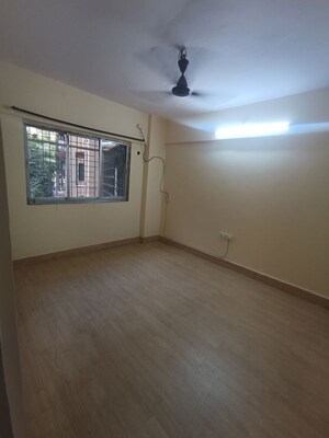 Bedroom in 2 BHK Apartment at Atlanta CHS, Malad West – for Rent