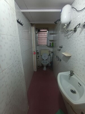 Bathroom in 2 BHK Apartment at Atlanta CHS, Malad West – for Rent