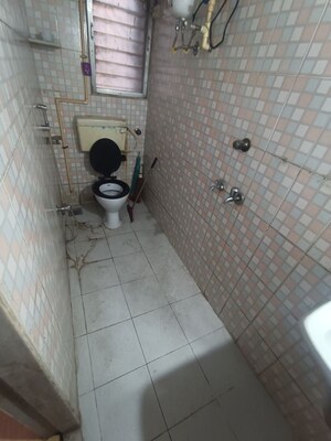 Bathroom in 2 BHK Apartment at Atlanta CHS, Malad West – for Rent