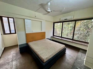 Bedroom in 2 BHK Apartment at New Ramratan CHS, Mahim West – for Sale