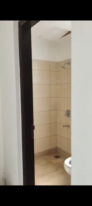 Bathroom in 3.5 BHK Apartment at Puri Diplomatic Greens Phase I, Sector 111 – for Rent
