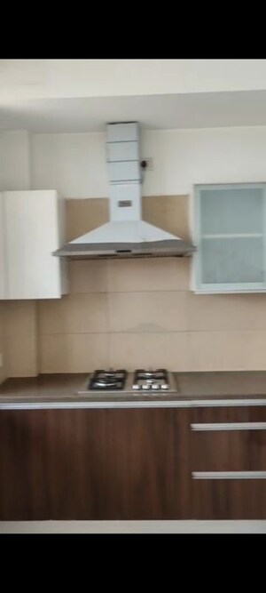 Kitchen in 3.5 BHK Apartment at Puri Diplomatic Greens Phase I, Sector 111 – for Rent