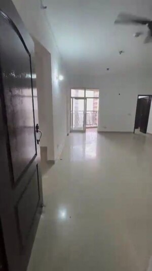 Room in 2.5 BHK Apartment at Paramount Symphony, Sain Vihar – for Sale