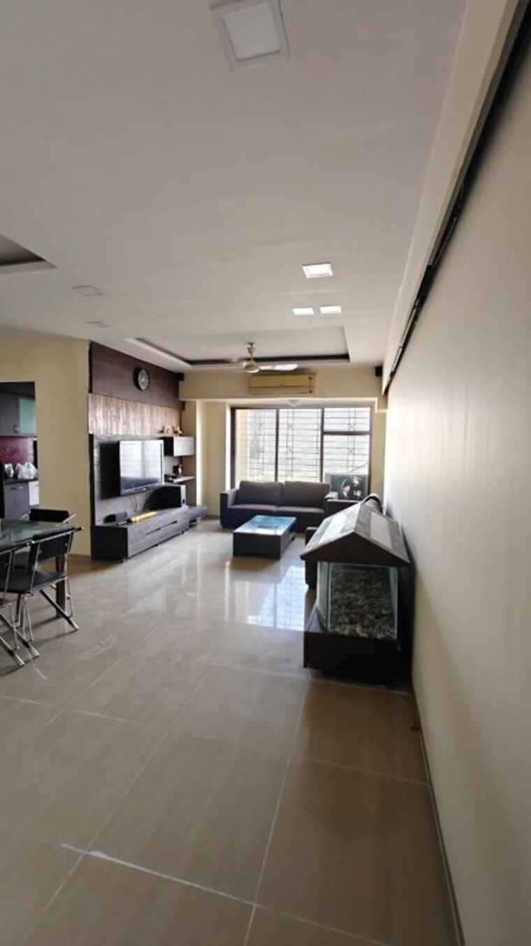 Living Room, unique-twins-tower-chs 4 Bedroom 2200 Sq.Ft. Apartment In Kharghar Sector 20 Navi Mumbai 10311779