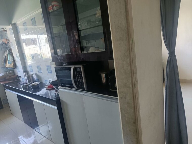 Kitchen, ghodbunder road 1 Bedroom 600 Sq.Ft. Apartment In Ghodbunder Road Thane 10311815