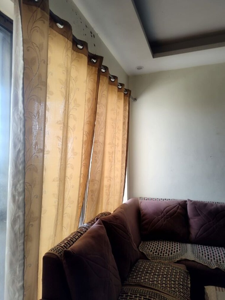 Living Room, charms-castle 2 Bedroom 975 Sq.Ft. Apartment In Raj Nagar Extension Ghaziabad 10311936