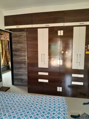 Living Room in 1 BHK Apartment at Aakanksha CHS, Borivali East – for Rent